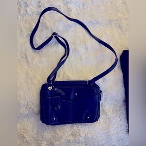 Small genuine leather crossbody with plenty of pocket space.